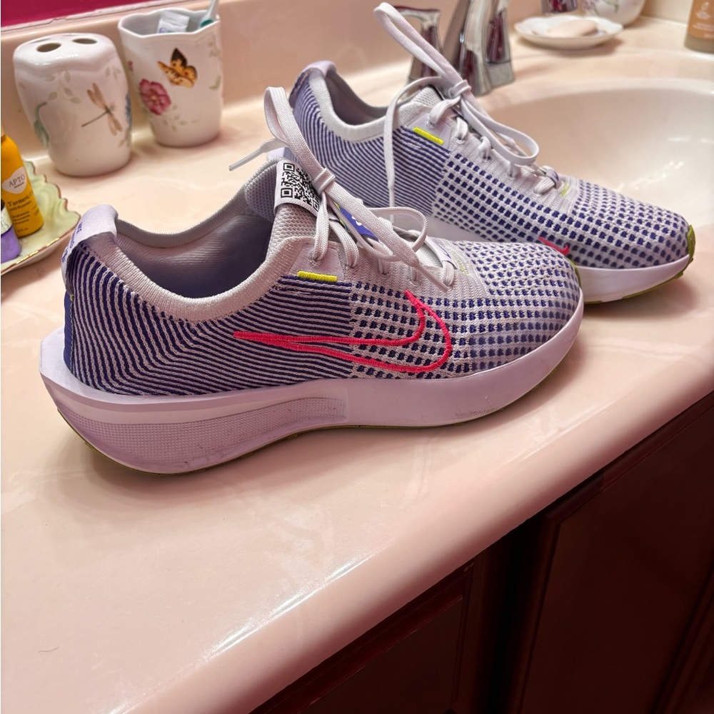 Nike White and Blue Sneakers with Pink Accents